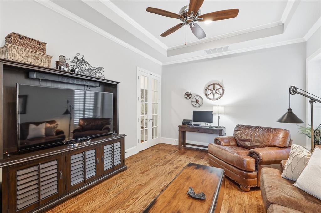 921 Winding Ridge Trail Southlake, TX 76092 - Photo 16 of 40 a living room with furniture and a wooden floor