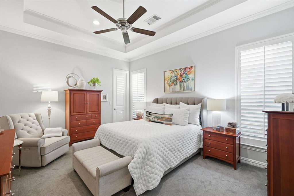 921 Winding Ridge Trail Southlake, TX 76092 - Photo 24 of 40 a bedroom with a bed couches and window