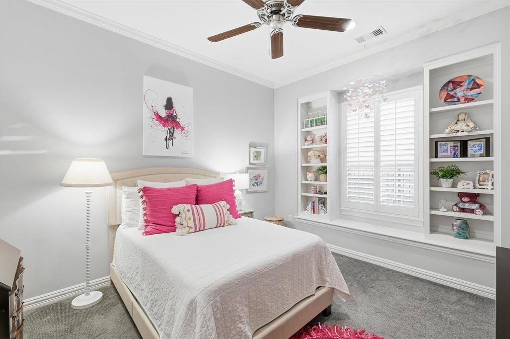 921 Winding Ridge Trail Southlake, TX 76092 - Photo 26 of 40 a bedroom with a bed and a large window