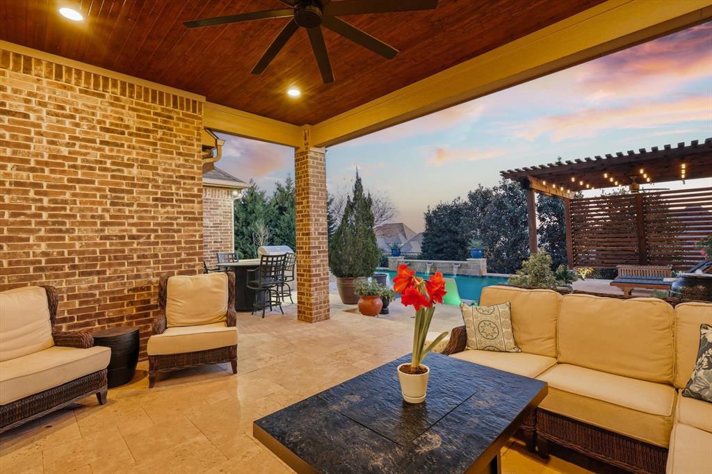 921 Winding Ridge Trail Southlake, TX 76092 - Photo 29 of 40 a outdoor living space with patio furniture and a potted plant