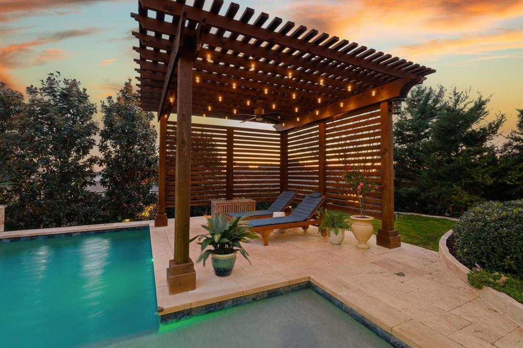 921 Winding Ridge Trail Southlake, TX 76092 - Photo 32 of 40 a view of a backyard with chairs