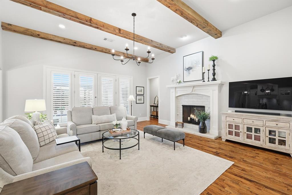 921 Winding Ridge Trail Southlake, TX 76092 - Photo 6 of 40 a living room with furniture fireplace and flat screen tv