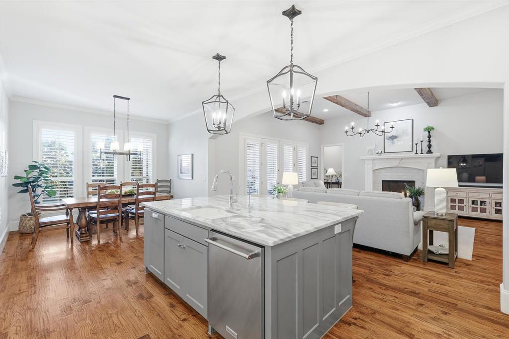 921 Winding Ridge Trail Southlake, TX 76092 - Photo 9 of 40 a open kitchen with sink and wooden floor