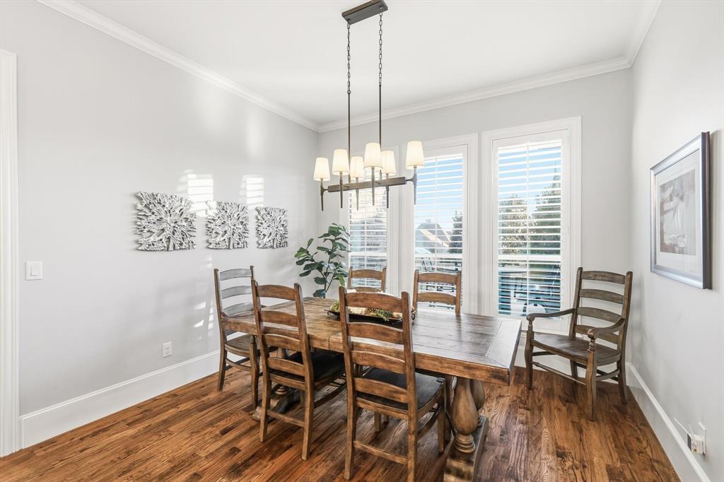 921 Winding Ridge Trail Southlake, TX 76092 - Photo 10 of 40 a view of a dining room with furniture window and wooden floor