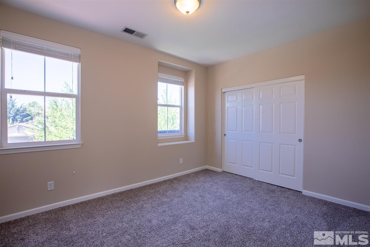13700 Seabiscuit Drive Reno, NV 89521 - Photo 24 of 27 a view of an empty room with a window