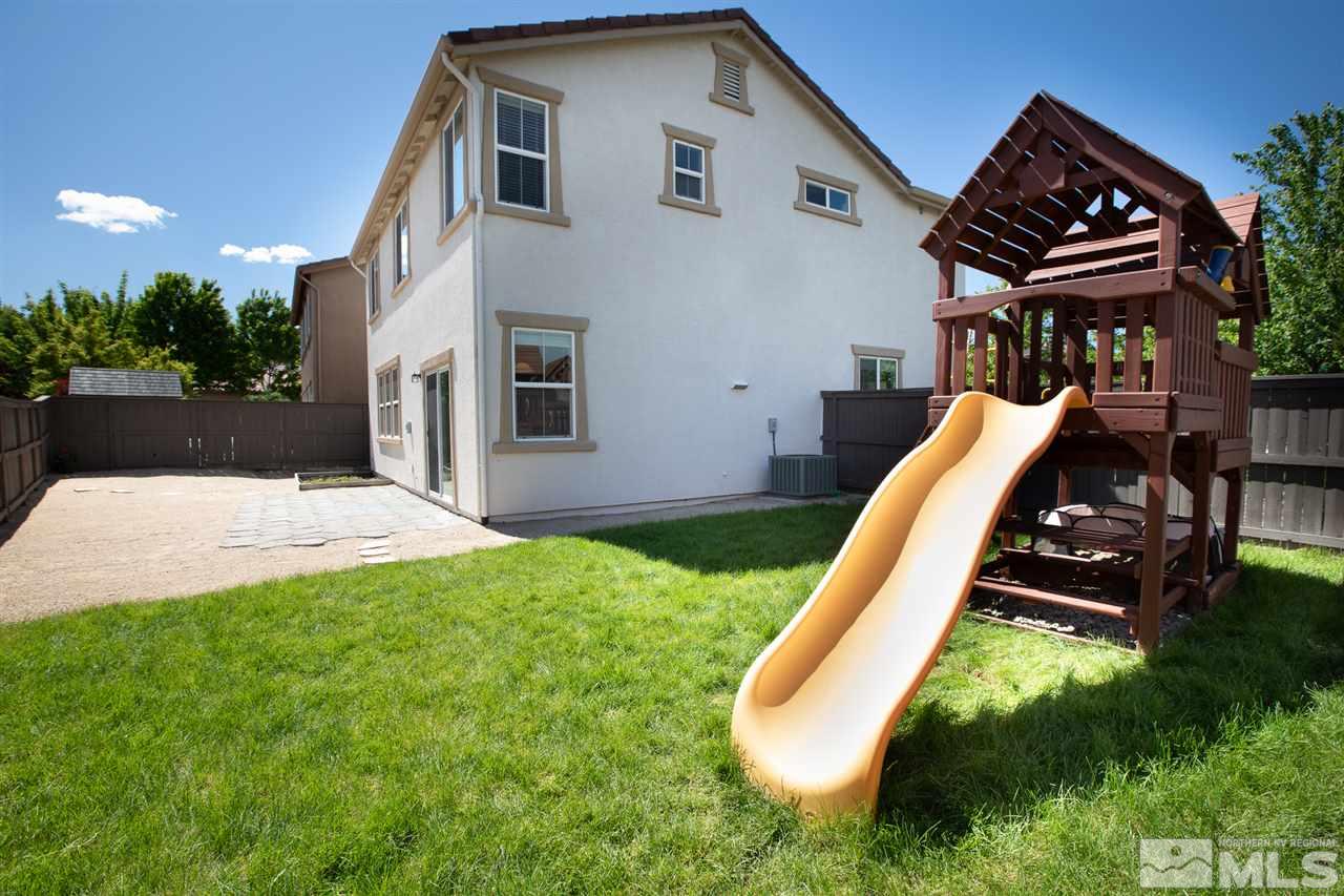 13700 Seabiscuit Drive Reno, NV 89521 - Photo 5 of 27 a view of a house with backyard