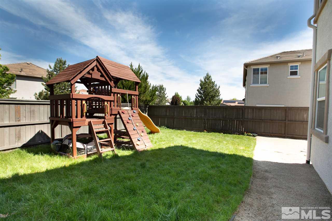 13700 Seabiscuit Drive Reno, NV 89521 - Photo 6 of 27 a view of a house with a park