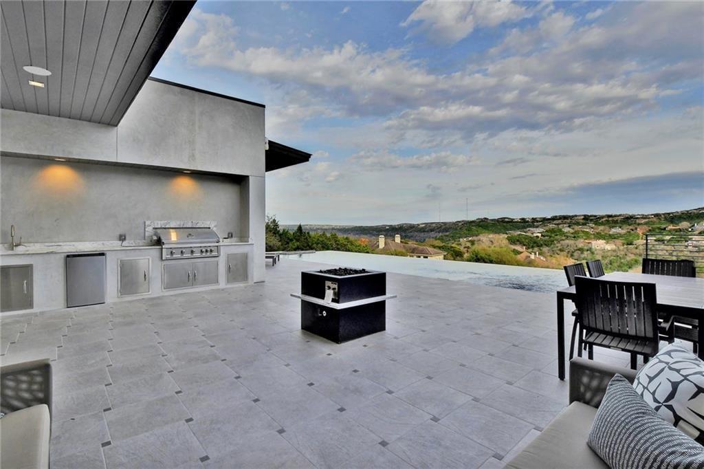600 Barrett Lane Austin, TX 78733 - Photo 29 of 35 a terrace with outdoor seating and city view