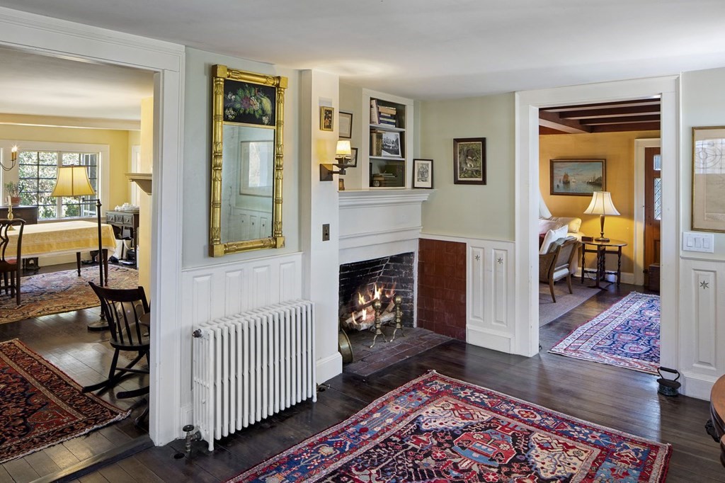 75 Bridge Street Manchester, MA 01944 - Photo 13 of 23 a living room with furniture and a fireplace