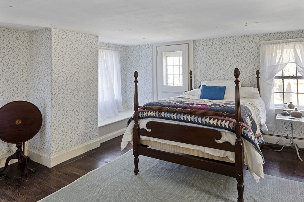 75 Bridge Street Manchester, MA 01944 - Photo 18 of 23 a bedroom with a bed and window