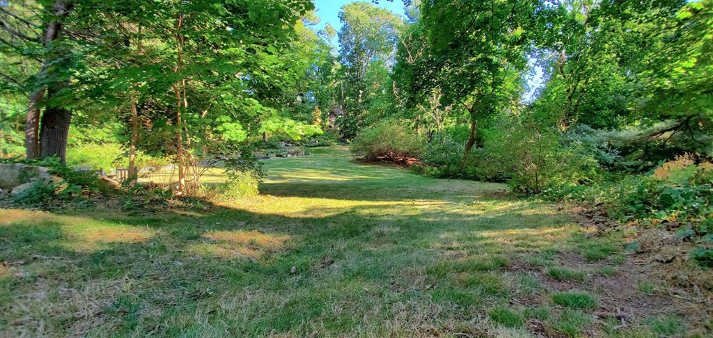75 Bridge Street Manchester, MA 01944 - Photo 9 of 23 a view of swimming pool from a yard
