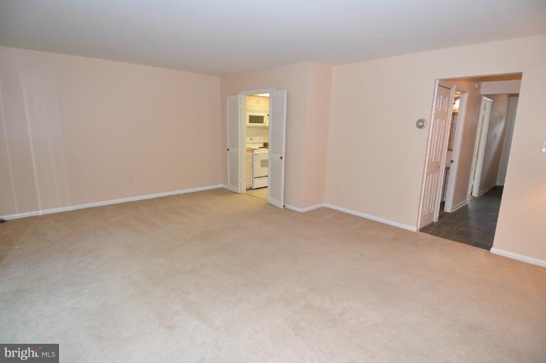 432 Colonial Ridge Lane Arnold, MD 21012 - Photo 20 of 25 Living Room - Open to Foyer and Kitchen