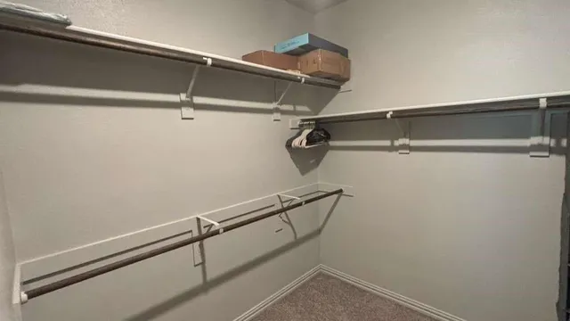 a view of a room with racks on the wall