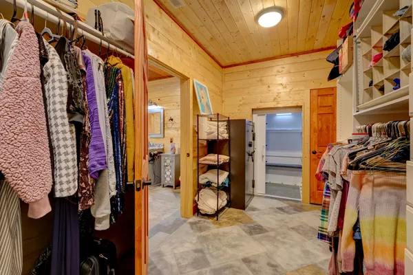 a room with gym equipment and a large window