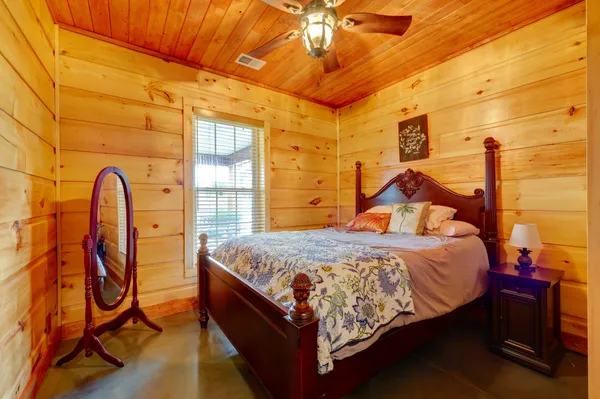 an aerial view of a house with outdoor space