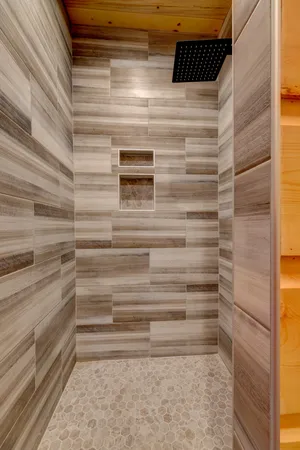 an aerial view of city and lake