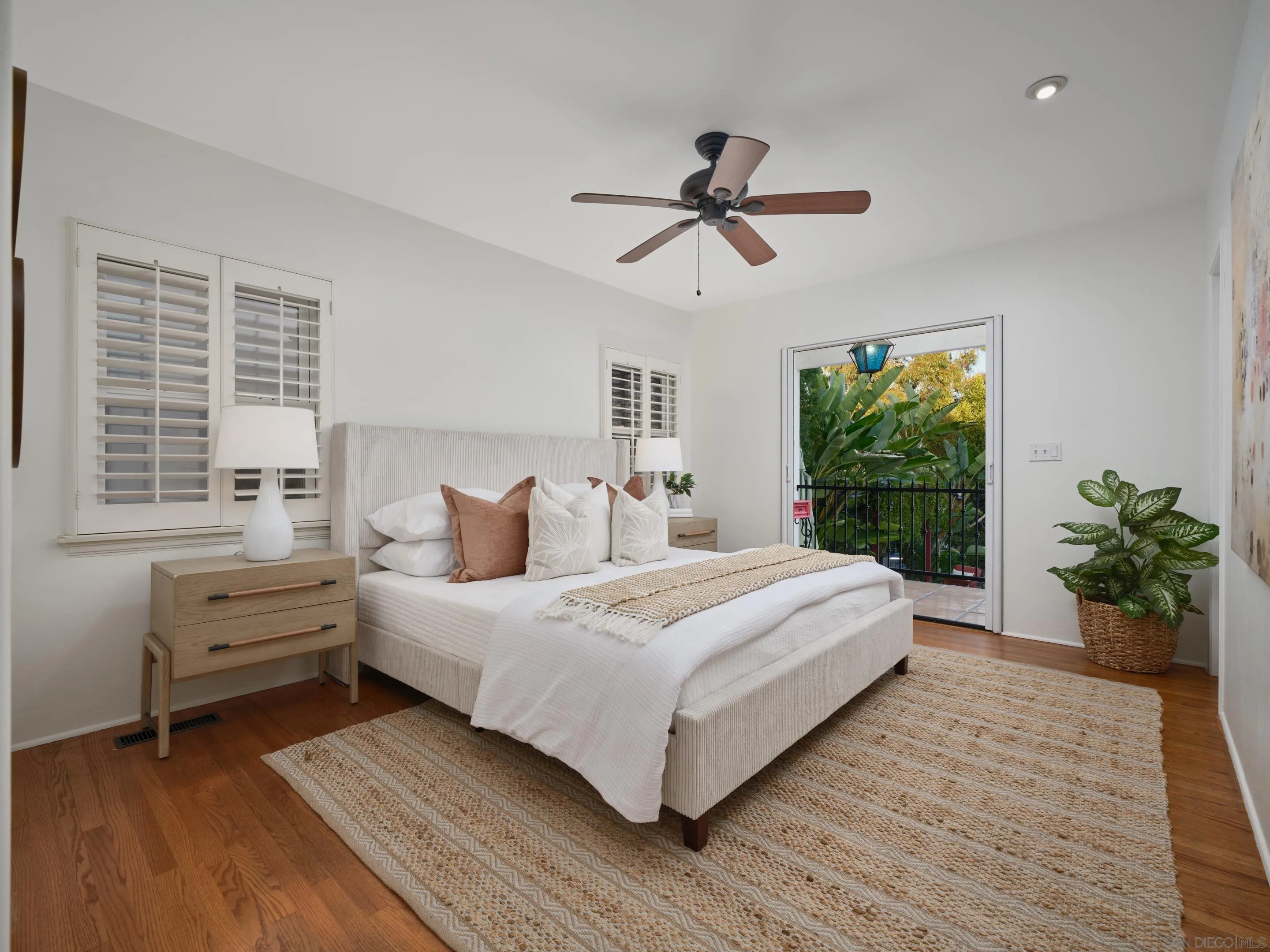 4725 Natalie Drive San Diego, CA 92115 - Photo 17 of 34 a bedroom with a large bed and a window