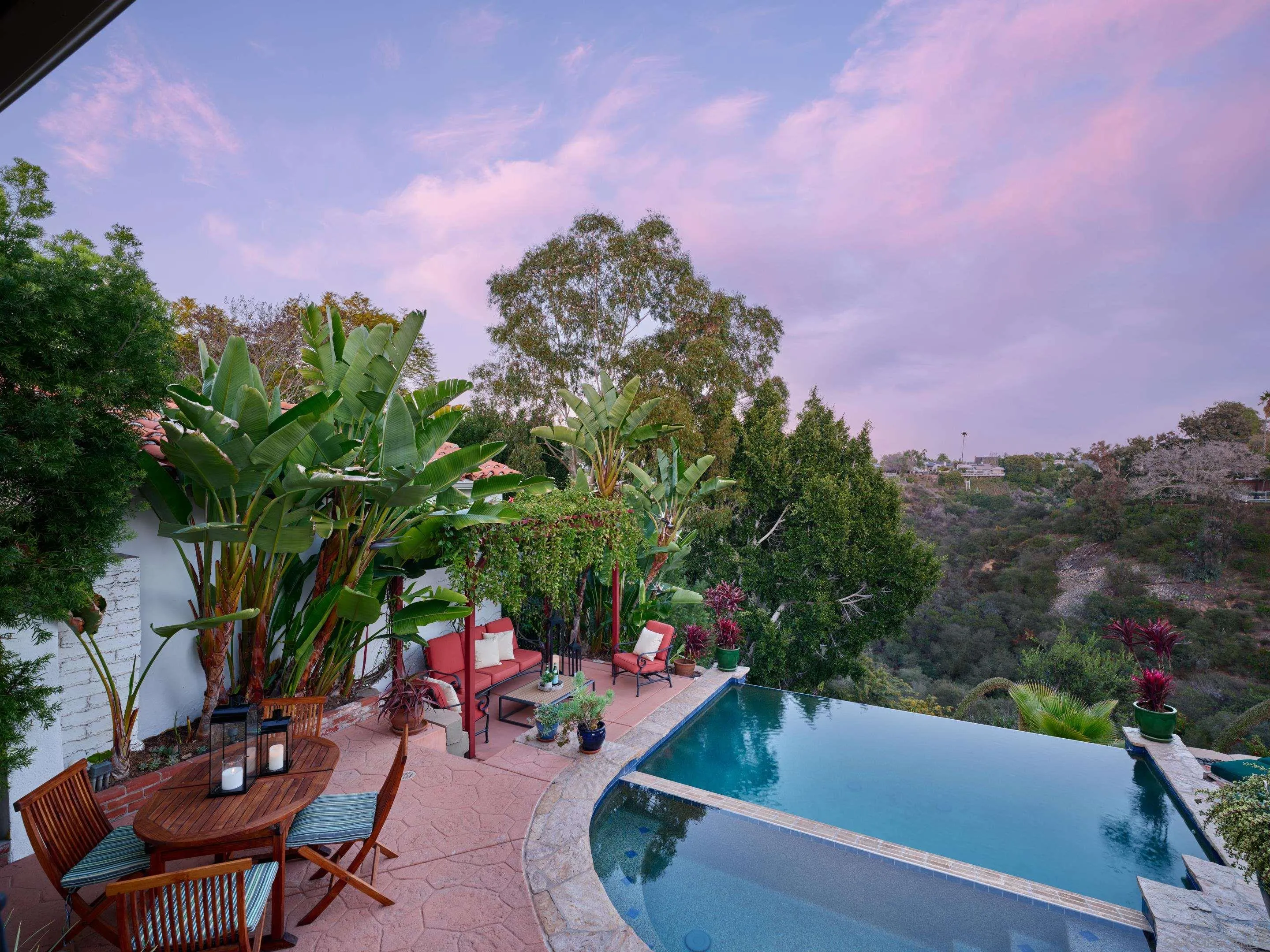 4725 Natalie Drive San Diego, CA 92115 - Photo 20 of 34 a backyard of a house with table and chairs