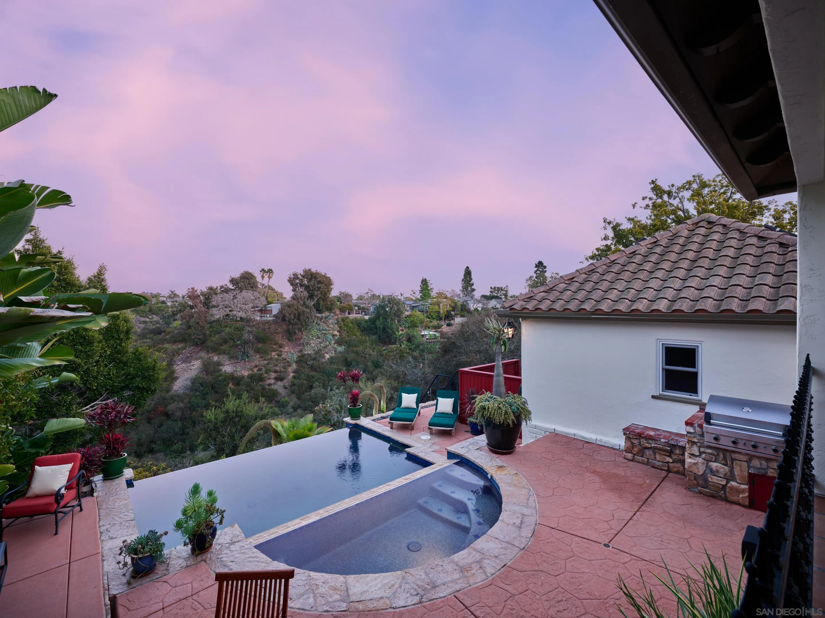 4725 Natalie Drive San Diego, CA 92115 - Photo 21 of 34 a house view with a sitting space and garden