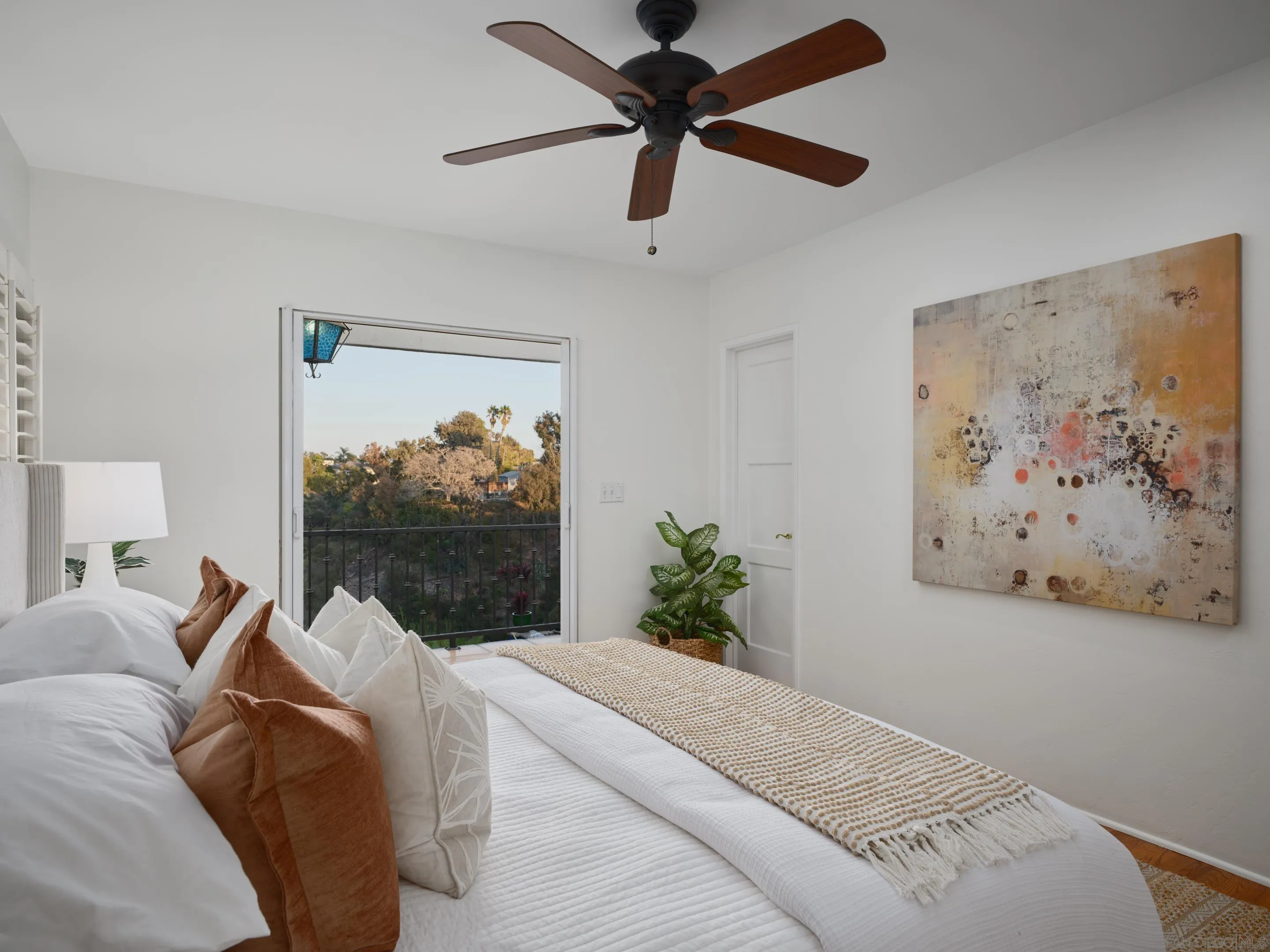 4725 Natalie Drive San Diego, CA 92115 - Photo 22 of 34 a living room with furniture and a painting on the wall