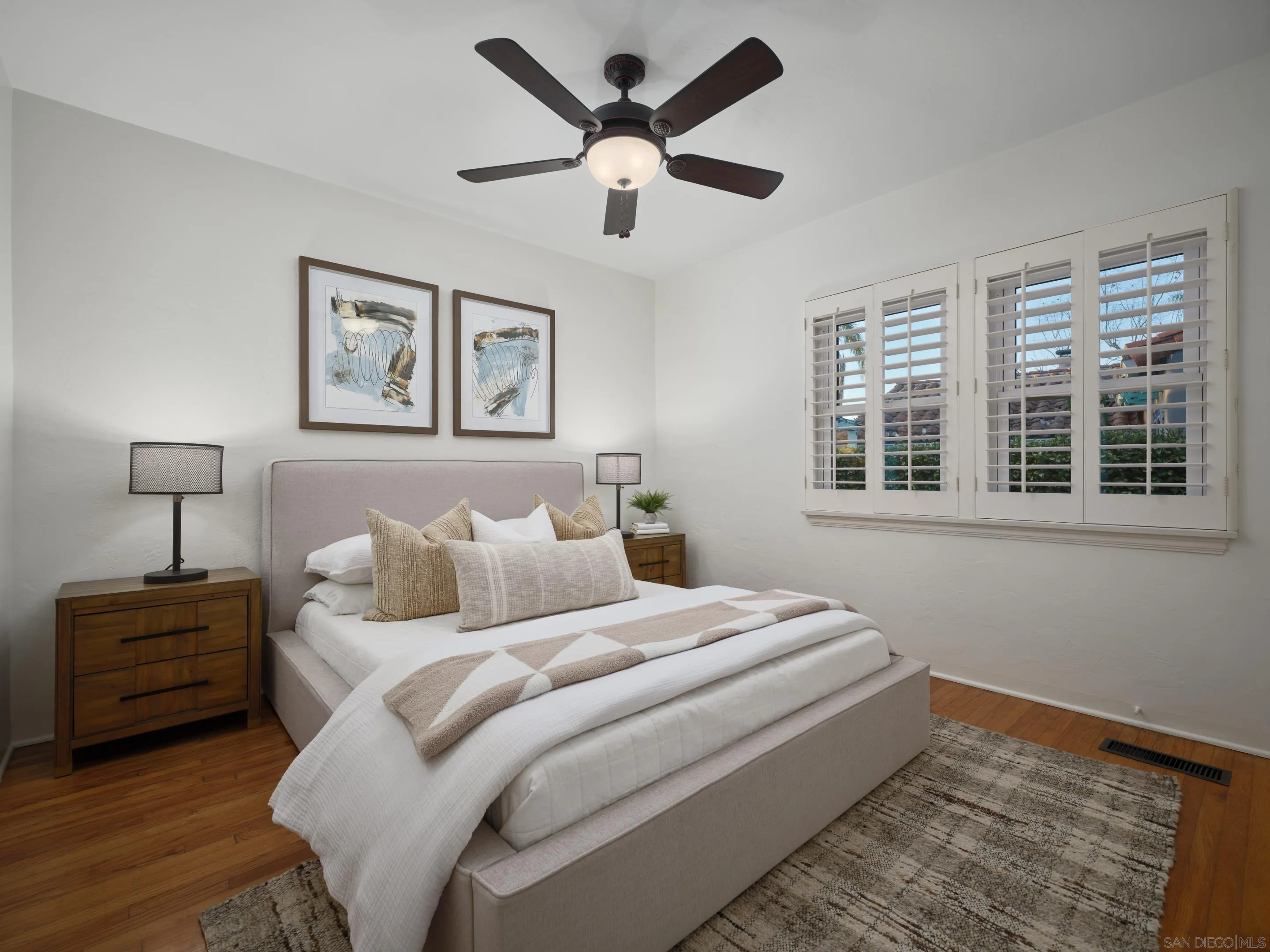 4725 Natalie Drive San Diego, CA 92115 - Photo 27 of 34 a bedroom with a bed and a large window