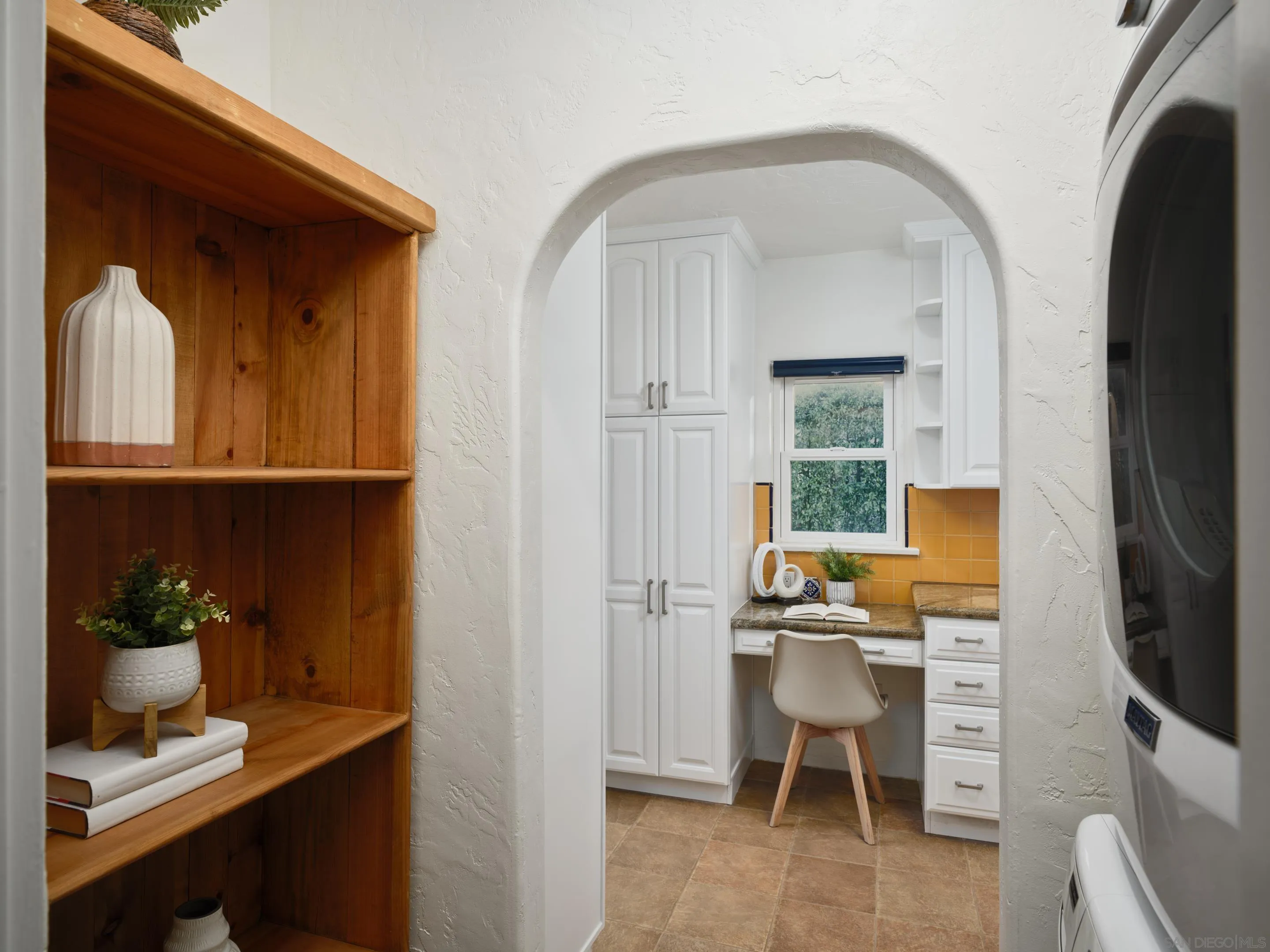 4725 Natalie Drive San Diego, CA 92115 - Photo 32 of 34 a workspace with wooden floor and a cabinet