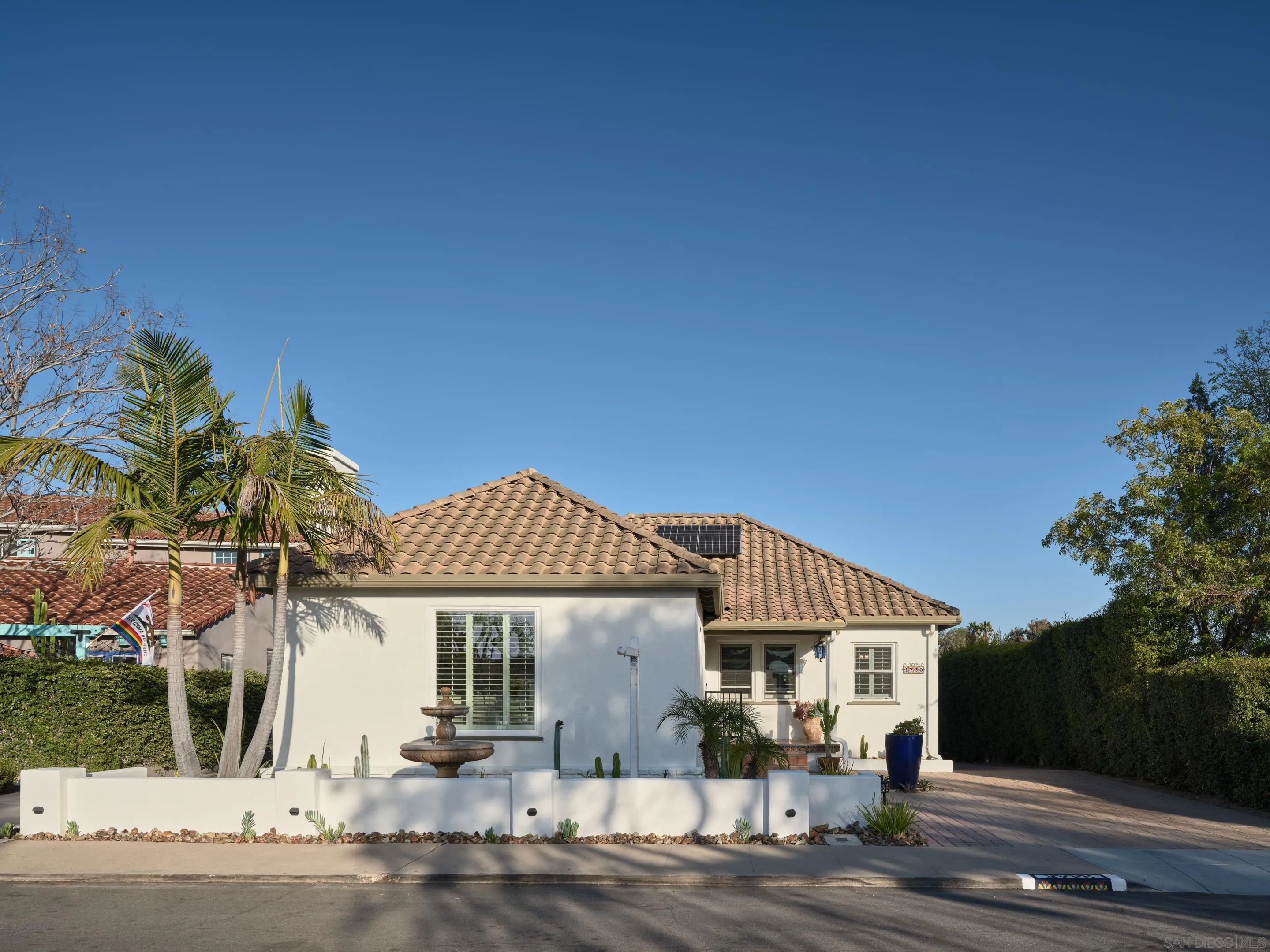 4725 Natalie Drive San Diego, CA 92115 - Photo 34 of 34 a front view of a house with a yard