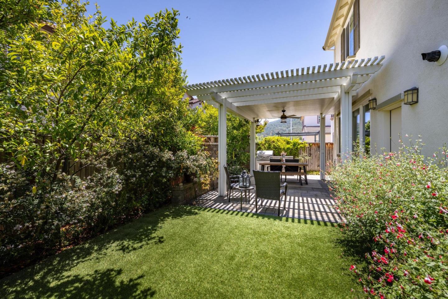 7708 Sumac Place Gilroy, CA 95020 - Photo 24 of 26 a view of a balcony dining table and chairs