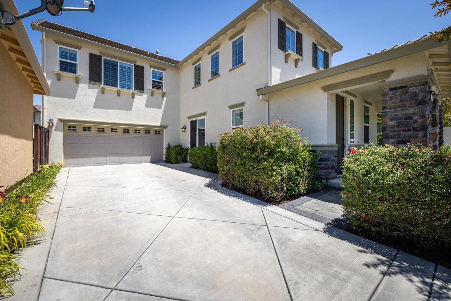 7708 Sumac Place Gilroy, CA 95020 - Photo 3 of 26 a view of a building with potted plants