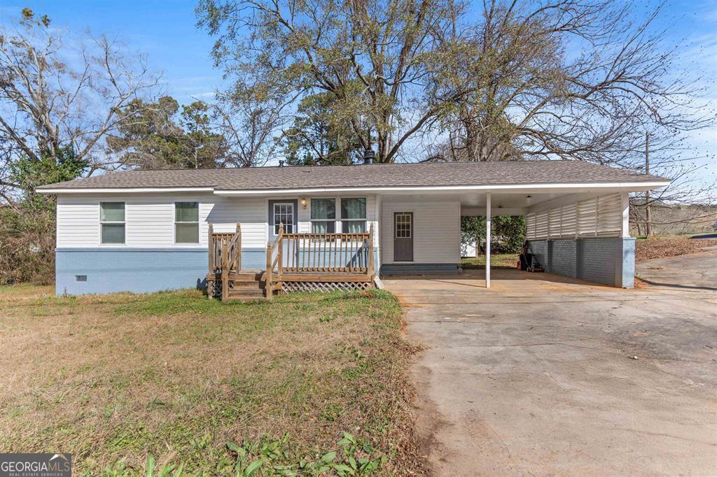 front view of a house with a patio