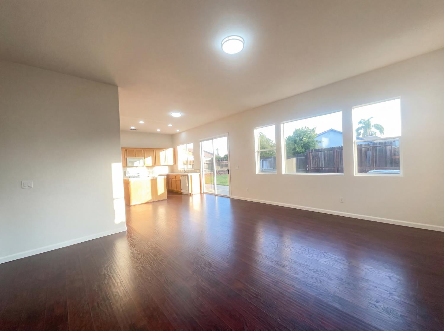 8137 Wyndwillow Way Elk Grove, CA 95758 - Photo 15 of 41 a view of a room with wooden floor and windows