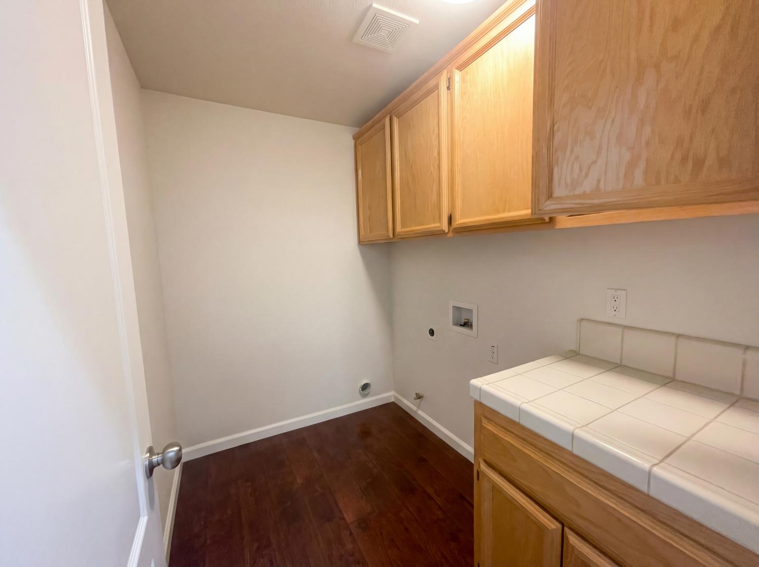 8137 Wyndwillow Way Elk Grove, CA 95758 - Photo 20 of 41 a view of storage and utility room with washer and dryer