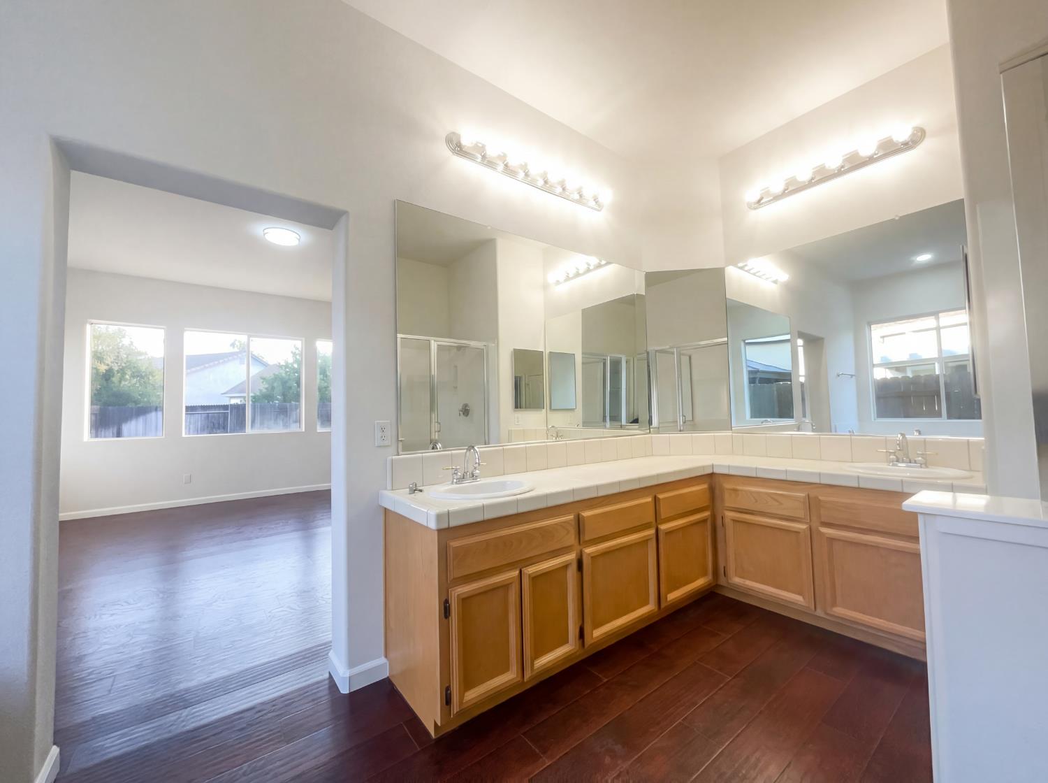 8137 Wyndwillow Way Elk Grove, CA 95758 - Photo 26 of 41 a large bathroom with a large tub and sink