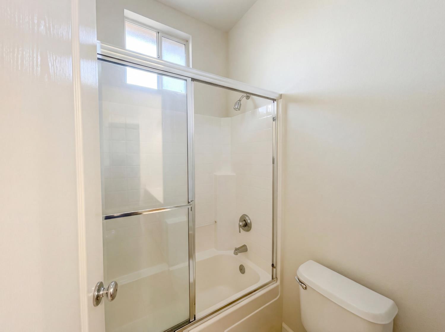 8137 Wyndwillow Way Elk Grove, CA 95758 - Photo 35 of 41 a bathroom with a shower and a toilet