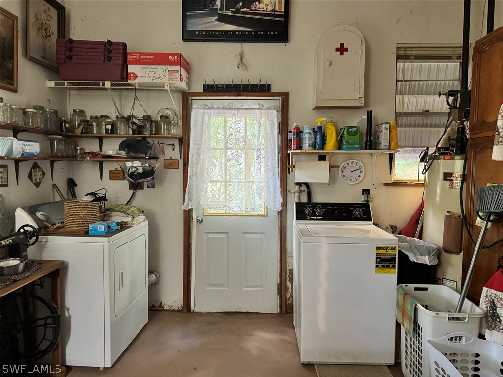720 E Road LaBelle, FL 33935 - Photo 26 of 40 a room with storage and utility