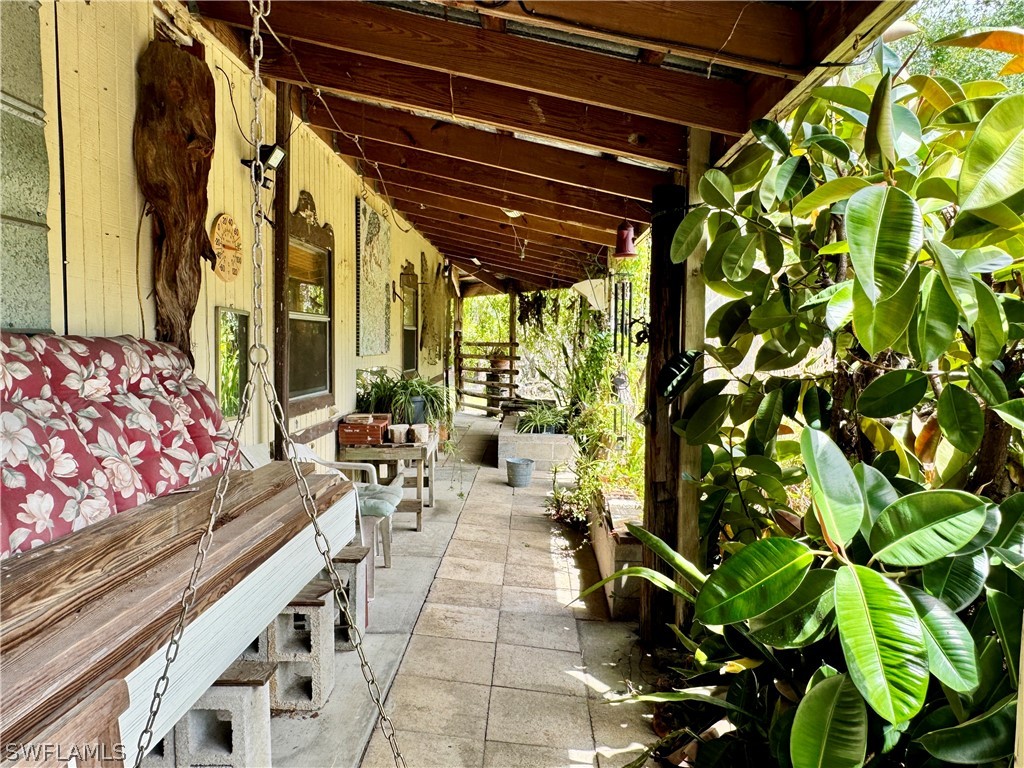 720 E Road LaBelle, FL 33935 - Photo 27 of 40 a outdoor space with lots of potted plants