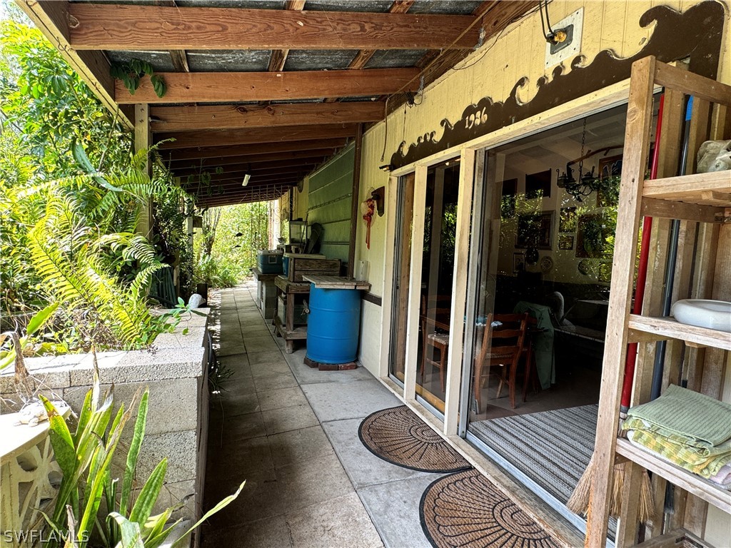 720 E Road LaBelle, FL 33935 - Photo 28 of 40 a view of a porch with furniture