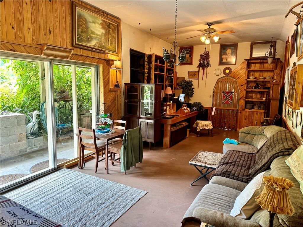 720 E Road LaBelle, FL 33935 - Photo 29 of 40 a living room with furniture a rug and a window