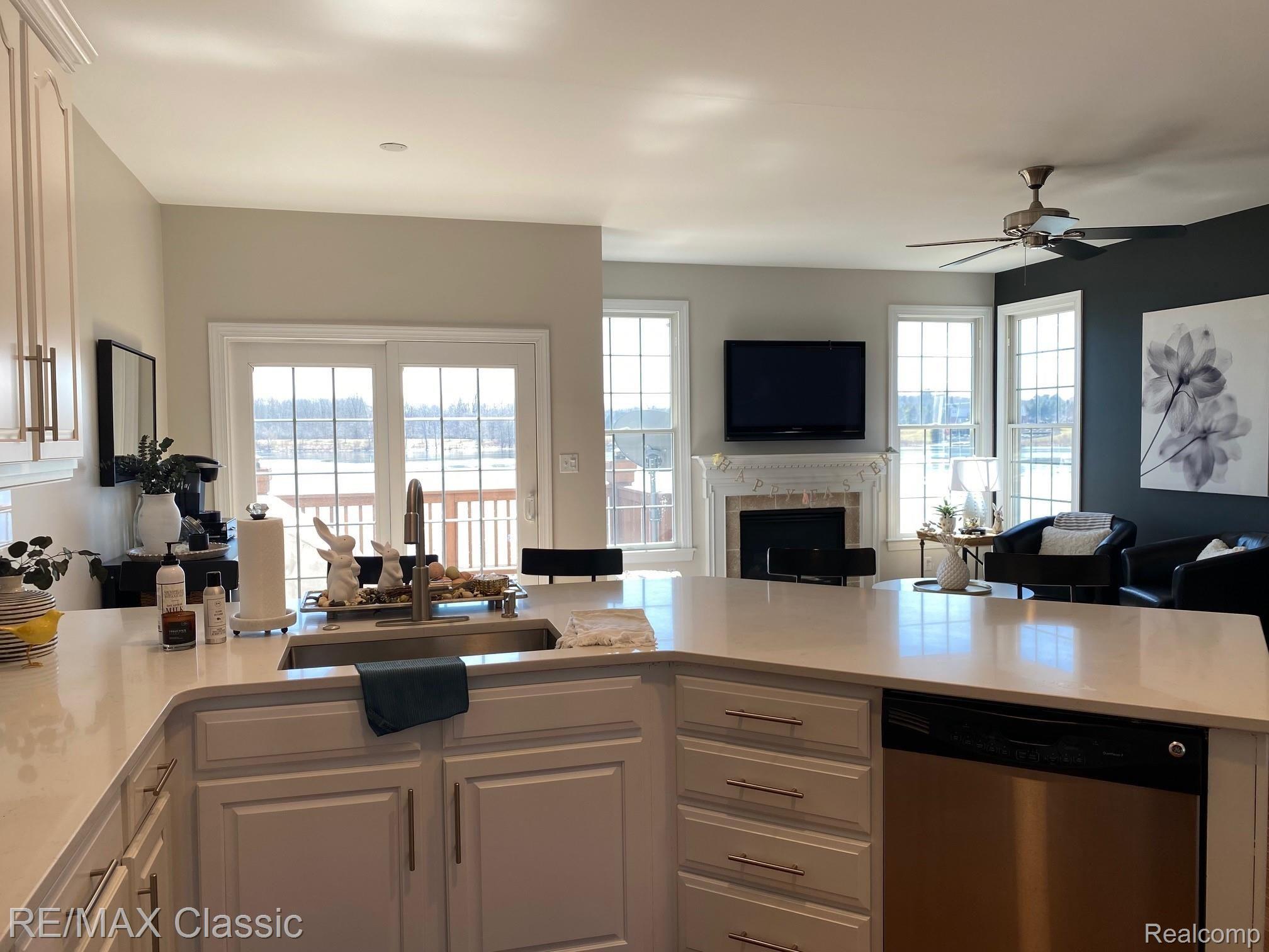 24905 Reeds Pointe Drive, Unit 14 Novi, MI 48374 - Photo 10 of 16 Kitchen w/Family Room & Gas Fireplace