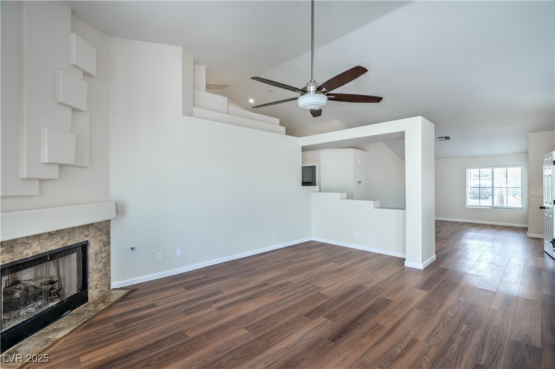 818 Coastal Beach Road Henderson, NV 89002 - Photo 14 of 39 Unfurnished Family room featuring vaulted ceiling,
