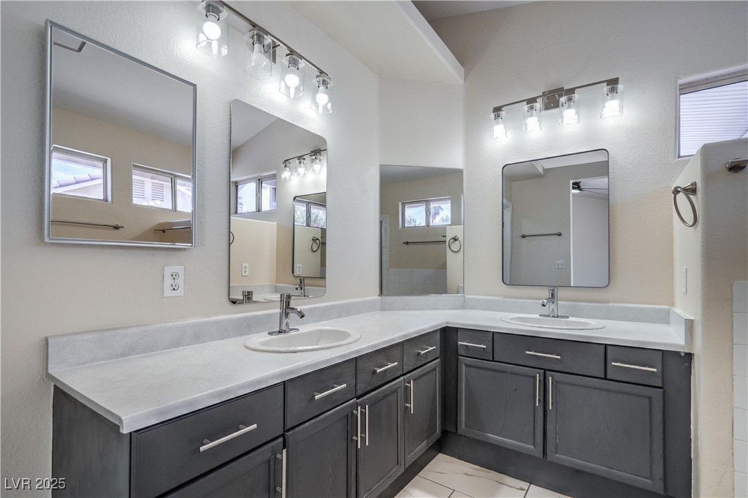 818 Coastal Beach Road Henderson, NV 89002 - Photo 23 of 39 Primary Bathroom featuring double vanity