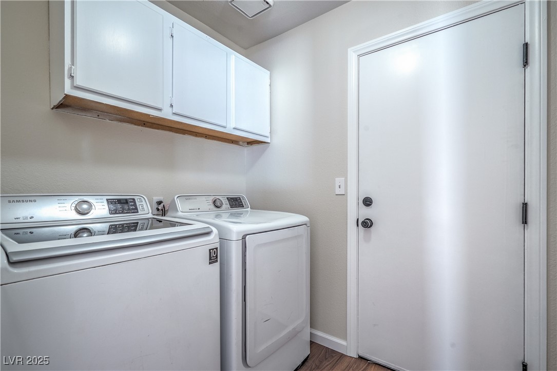 818 Coastal Beach Road Henderson, NV 89002 - Photo 30 of 39 Laundry room with washer and dryer, cabinet space,