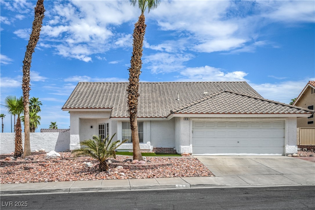 818 Coastal Beach Road Henderson, NV 89002 - Photo 3 of 39 View of front facade with concrete driveway, a gar