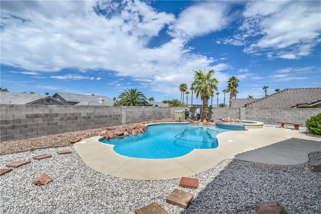 818 Coastal Beach Road Henderson, NV 89002 - Photo 32 of 39 View of swimming pool with a fenced backyard, a pa