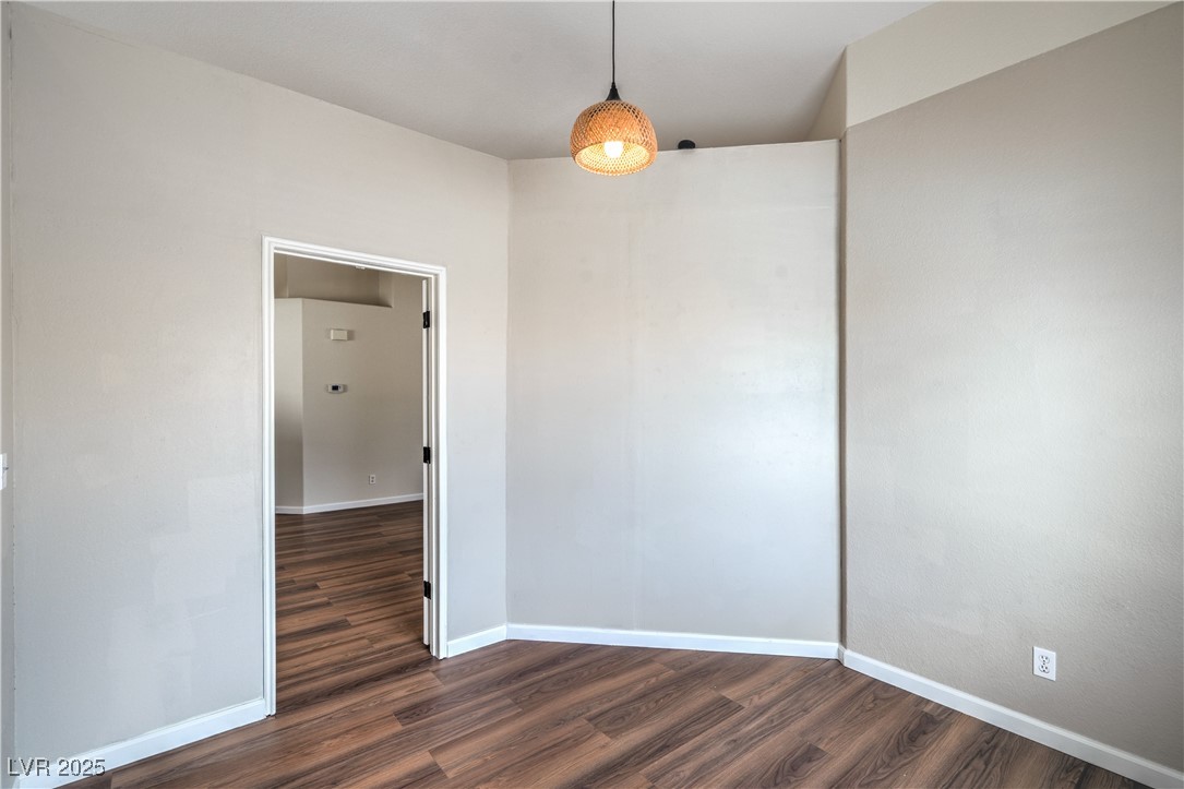 818 Coastal Beach Road Henderson, NV 89002 - Photo 10 of 39 Den/Office featuring baseboards and dark laminate