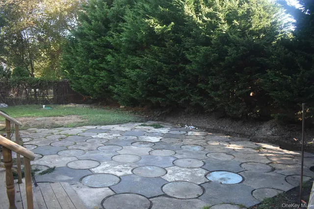 a backyard of a house with lots of green space