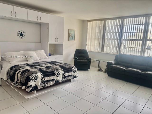 100 Lincoln Road, Unit 1030 Miami Beach, FL 33139 - Photo 1 of 35 a bedroom with a bed and a couch