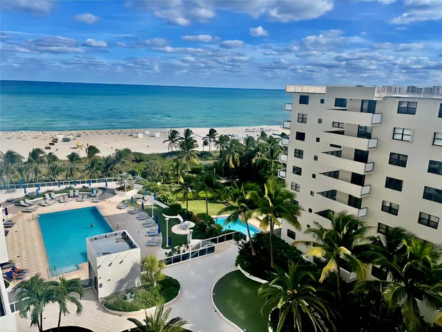 a view of a swimming pool with a garden