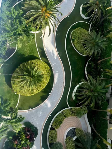 a view of a backyard of the house