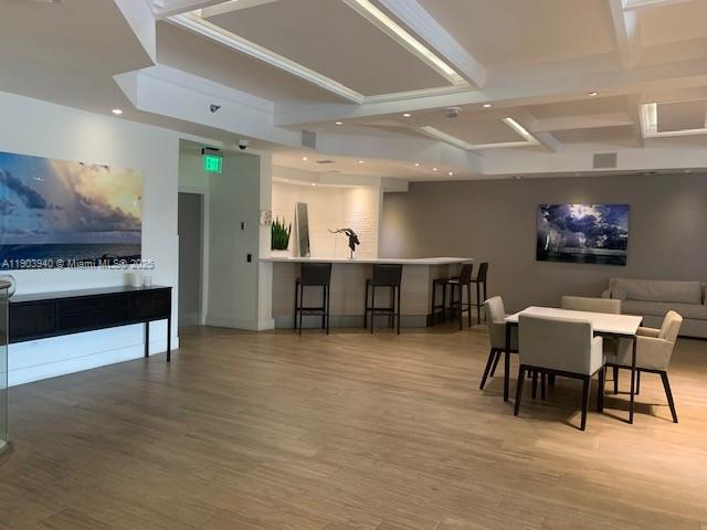 100 Lincoln Road, Unit 1030 Miami Beach, FL 33139 - Photo 22 of 35 a view of a room with furniture and a kitchen